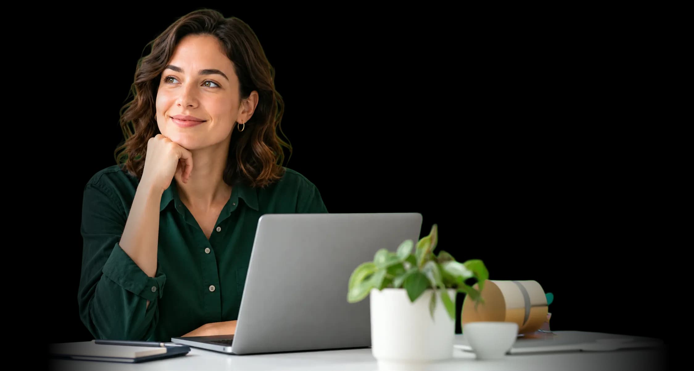Hiring manager reviewing candidate results at a laptop